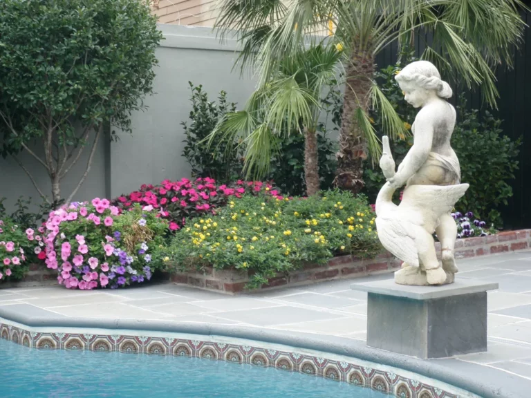 Angel statue flanks French Quarter pool