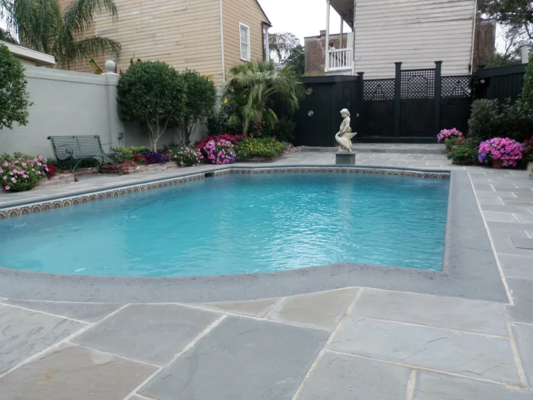 Blue flagstone surrounding French Quarter pool